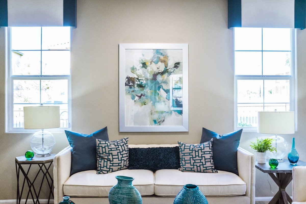 Round mirror placed thoughtfully on living room wall — example of intentional feng shui mirror placement away from doors and beds